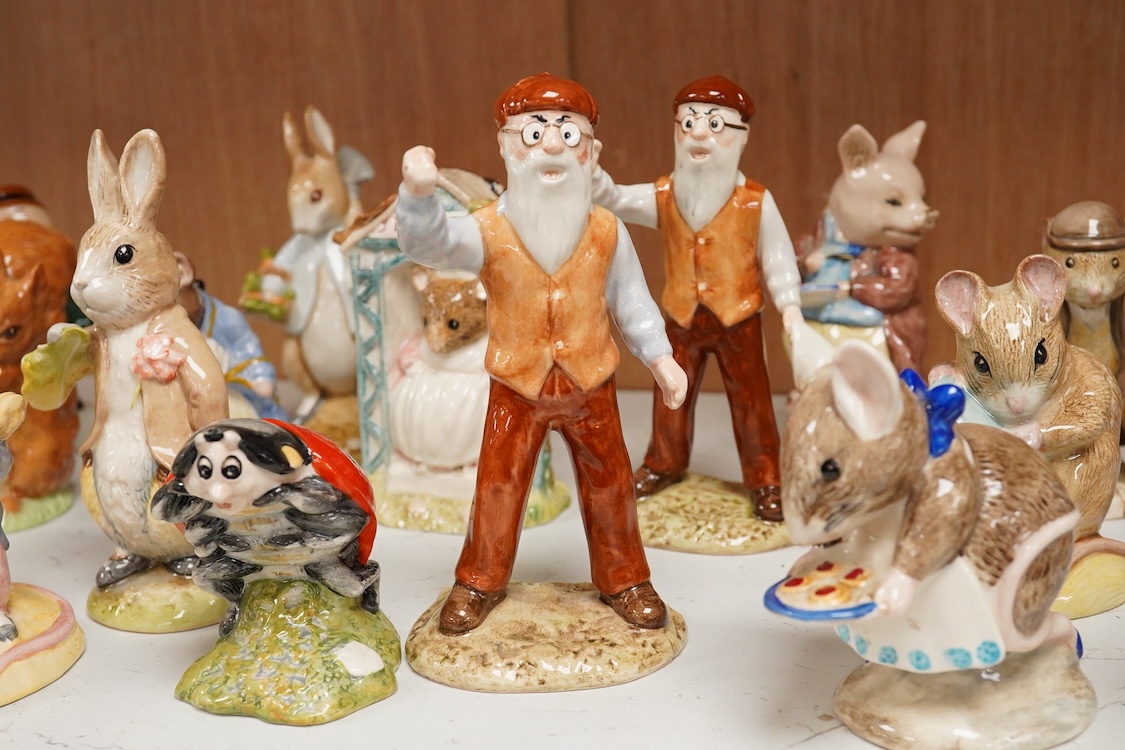 A collection of eighteen mixed Royal Doulton and Royal Albert figures of Beatrix Potter characters, largest 13cm high